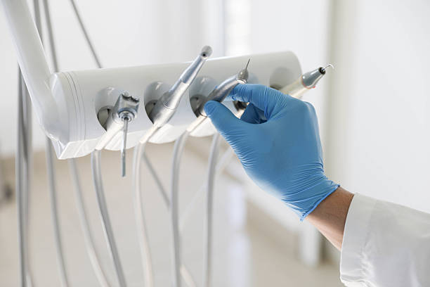 Professional Tooth Extraction technician working in Hall County County, TX